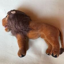 Lion rempli de sciure de bois