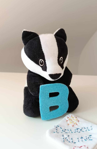 Peluche doudou petit - petit, blaireau