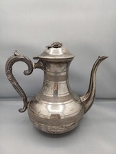 Théière ancienne en métal