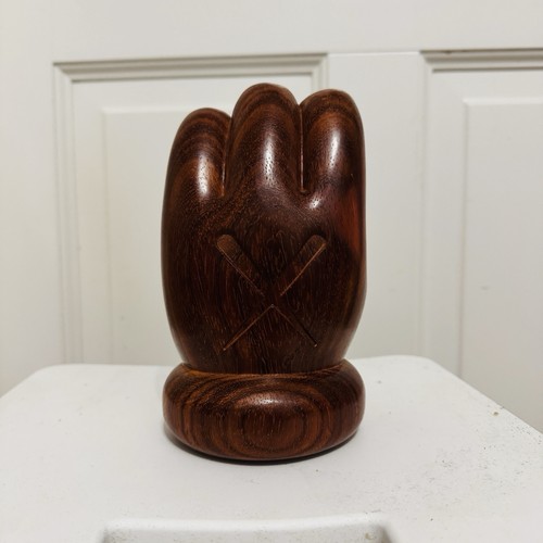 Kaws giswil more wooden hand - kaws,