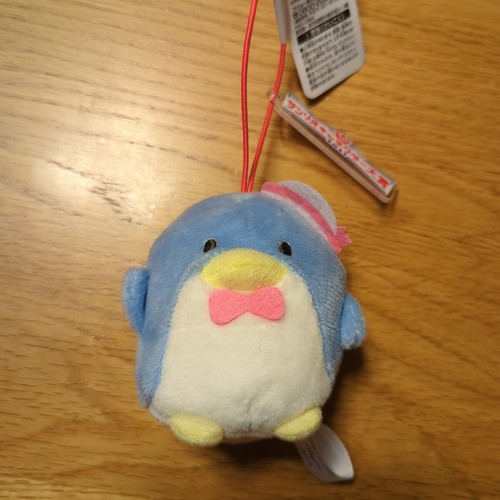 Mascotte peluche smoking - en,