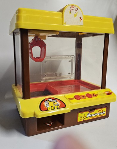 Machine grappin pikachu - a,