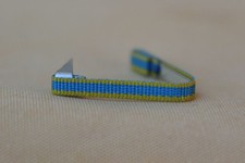 Fixe ruban rappel boutonnière