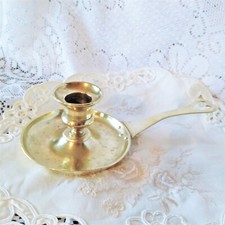 Bougeoir à main cuivre doré