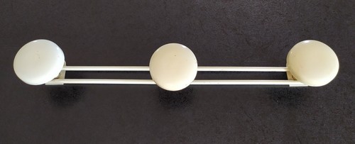 Véritable porte manteau