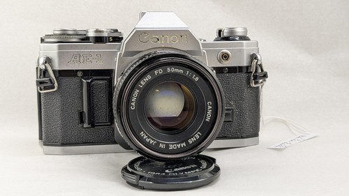 Canon avec objectif - ae-1,