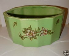 @ JARDINIERE EN FAIENCE SIGNEE