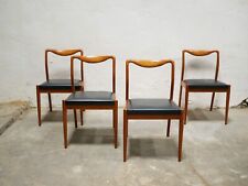 Série de 4 chaises scandinaves vintage en teck et en skaï