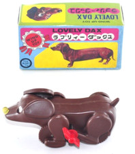 Jouet ancien en étain chiot teckel remontoir AOKI Japon non utilisé Deadstock...