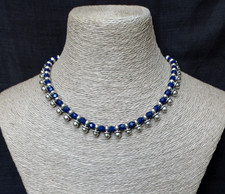 Scooter Paris. Collier perles