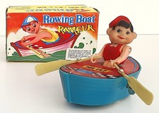 RAMEUR DANS BATEAU  CANOT À