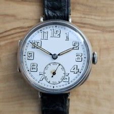 Montre homme vintage en argent