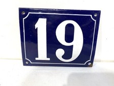 Antique enamel plaque bombed street number 19