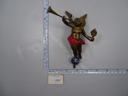 Left side brass warmink - left, statue