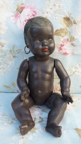 Black little colin doll - black,