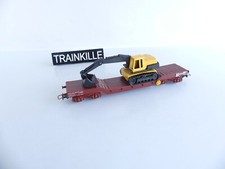 JOUEF FRANCE HO WAGON SURBAISSE A BOGIES + ENGIN TRACTO-PELLE