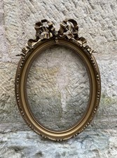 CADRE OVALE DORE EN BOIS ET
