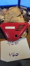 KAWASAKI KE 125 1980 - 1983 LEFT SIDE COVER OIL TANK NOS  36001-1080-6L RED