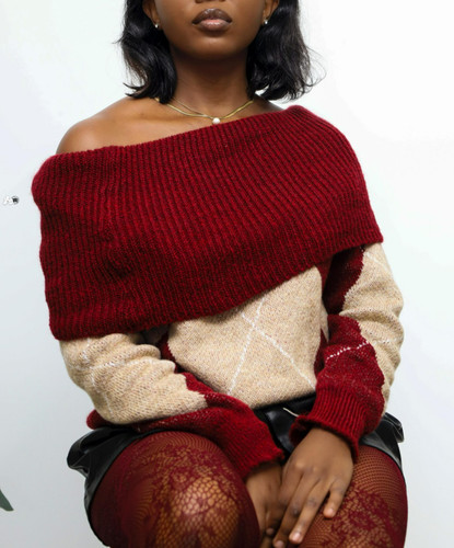 Pull rouge motifs forme - à,