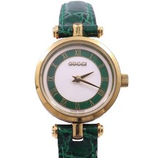 Montre Gucci en forme ronde