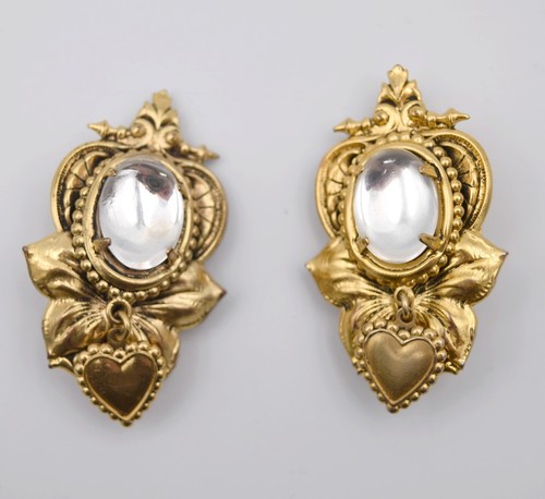 Paire boucles oreilles à - de,