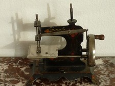 ANTIQUE SMALL SEWING MACHINE BABY TOY CHILDREN Lithographed Sheet Metal