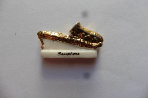 Fève porcelaine saxophone - en,