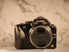 Panasonic Lumix Digital Camera With Panasonic Lumix 14-42mm lens.