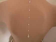 Chute/bijou de dos pr collier