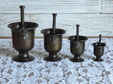 4 anciens mortiers en bronze