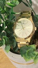 Montre Lotus dorée or gold