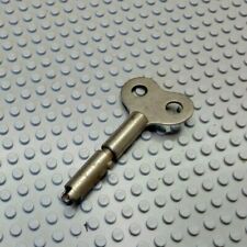 clef remontoir mouvement mecanique carillon pendule horloge rond a crans