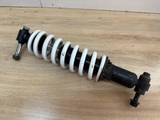 UN AMORTISSEUR ARRIERE 11000