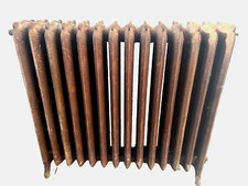 Ancien radiateur sur pied a quatorze lames fleuries en fonte de fer XX siècle