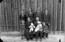 Family group in front of barn door - old photo negative glass year. 1940