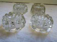 set of 4 glass feet to enhance furniture tables