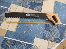 Scie à matériaux avec dents