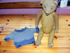 ancien ours Bâton remplis de paille hauteur 52 cm vendu dans l'état.