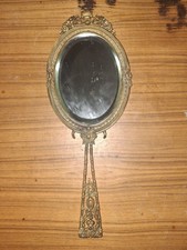 Superbe miroir face à main en