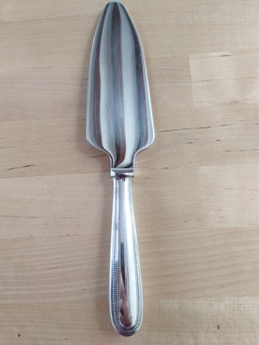 Pelle coupante tarte ou - À,