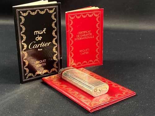 Briquet must cartier en - must,