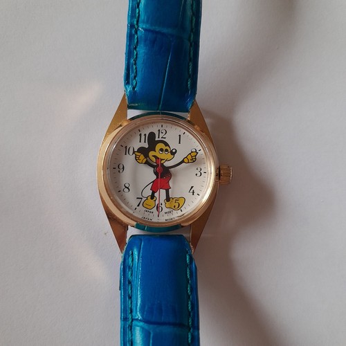 Montre mickey mécanique bras - ,