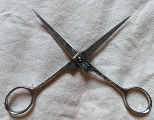 Ciseaux coiffeur anciens - de,