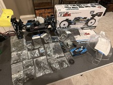 TEAM ASSOCIATED RC8B4.1 TEAM KIT W/ LOTS OF SPARES.