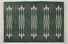 Designer textile suédois. Tapis tissé à la main en pure laine. Design moderni...