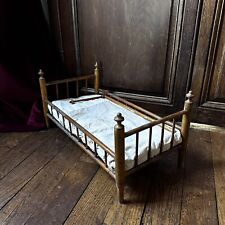 Antique bamboo doll bed with mattress