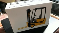 NZG 375 - STEINCOCK Boss Yellow Pallet Trans 1:25