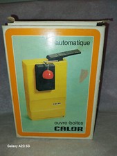 ouvre boîte ancien orange et