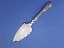 Très belle pelle à tarte métal argenté