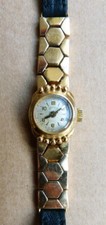 Montre femme DIVINE en OR